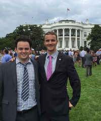 (From left) Fellow GPS alumnus Nathaniel Jones and DeZubiria attend an event on the White House south lawn