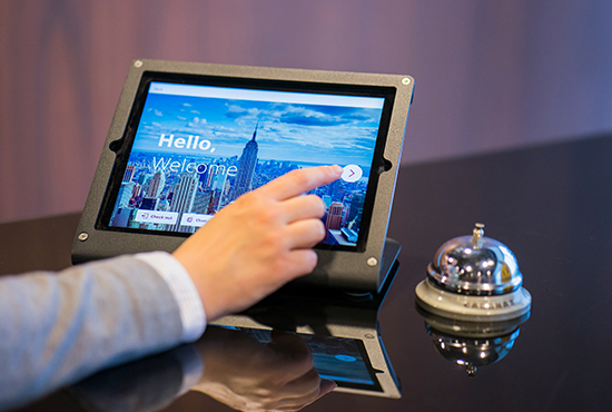 Tablet to check into hotel with bell