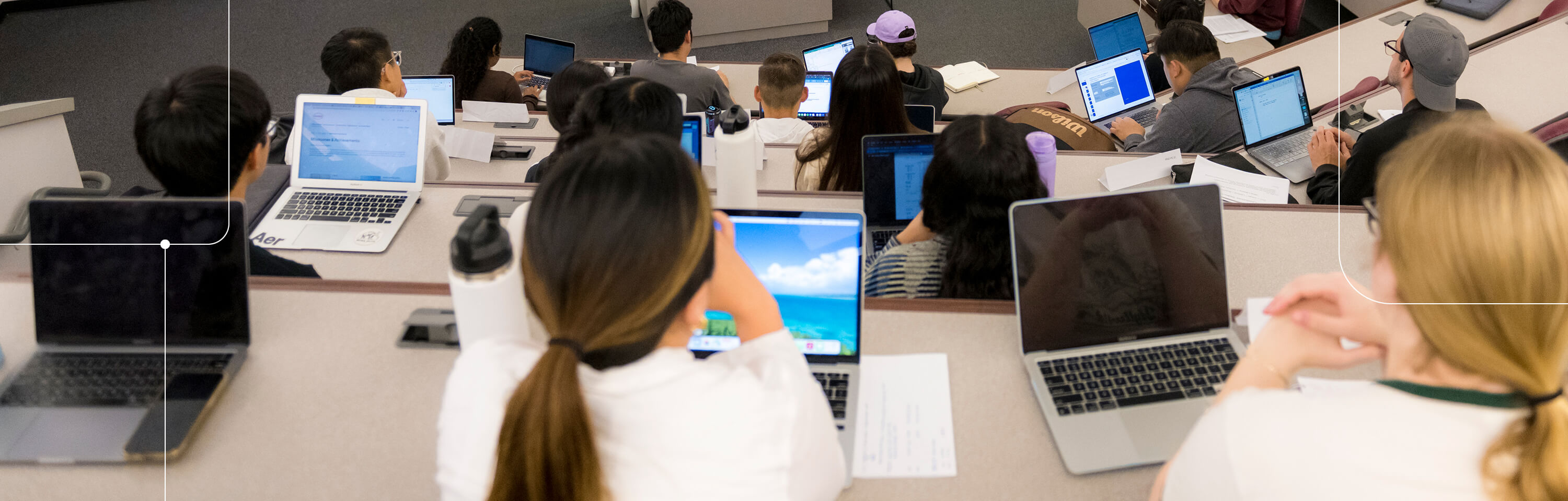 Students in a classroom on their laptops